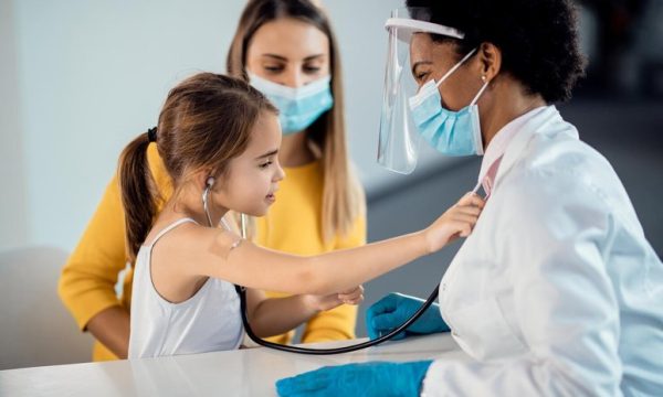 cute-girl-using-stethoscope-checking-pediatrician-s-heart-beat-medical-clinic_637285-11312_1